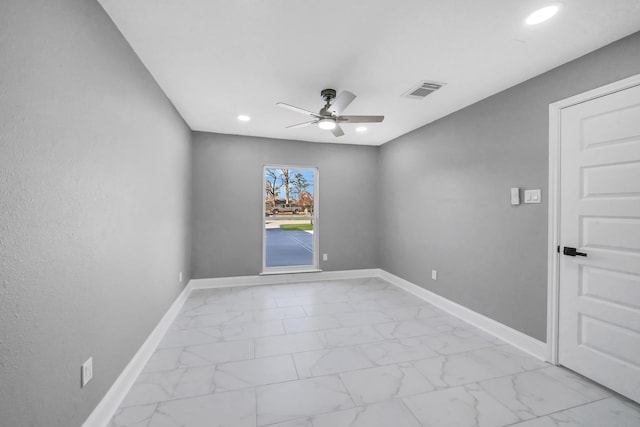 unfurnished room featuring ceiling fan