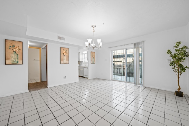 interior space with light tile patterned floors and a notable chandelier