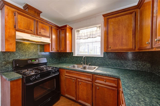 kitchen with sink, gas stove, and decorative backsplash