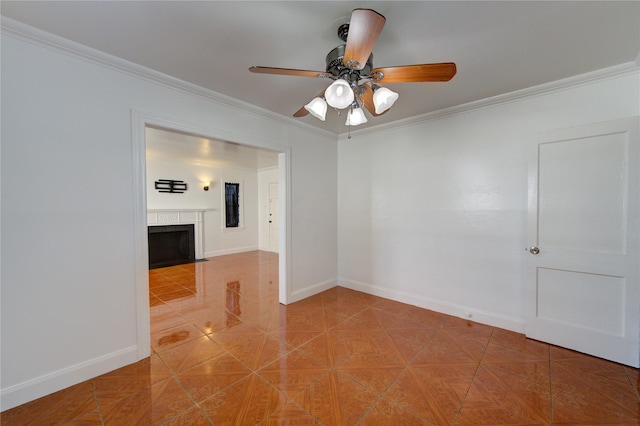 empty room featuring crown molding, ceiling fan, and parquet floors