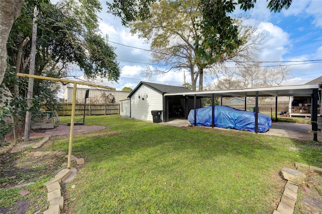 view of yard with a covered pool