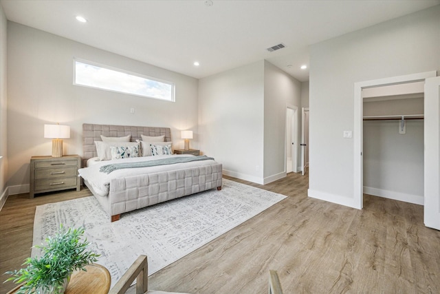 bedroom with light wood-type flooring