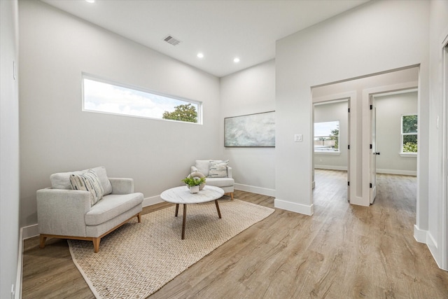 sitting room featuring light hardwood / wood-style flooring