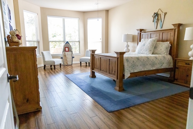 bedroom featuring hardwood / wood-style flooring