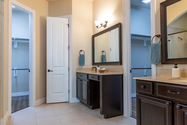 bathroom with vanity and tile patterned floors