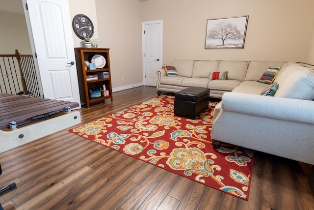 living room with dark wood-type flooring