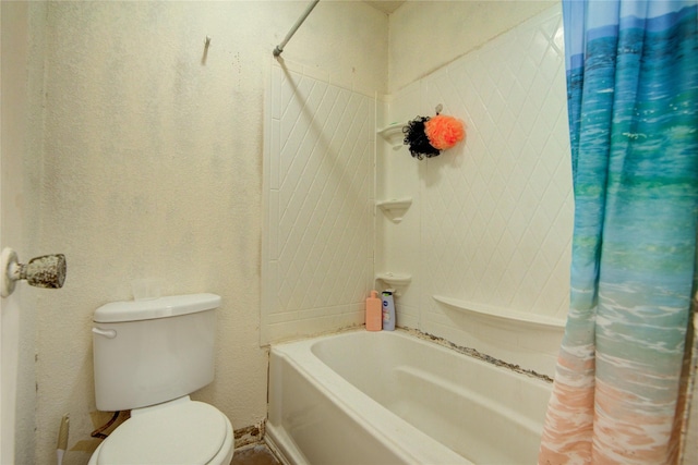 bathroom with shower / bath combination with curtain and toilet