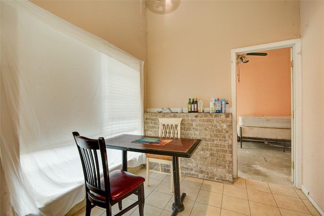 dining space with light tile patterned floors