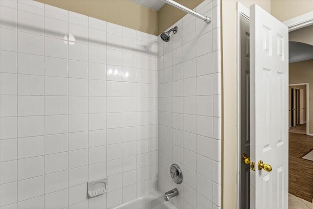 full bath featuring shower / bathtub combination