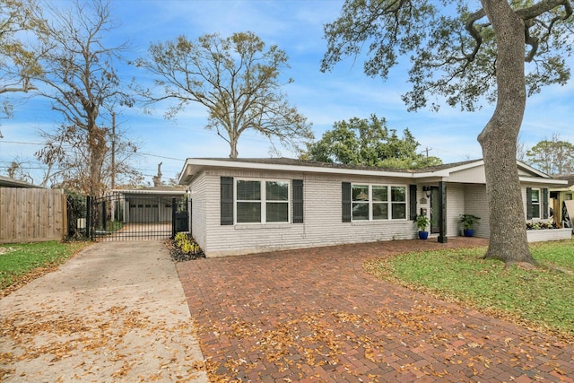 view of front of property featuring a carport