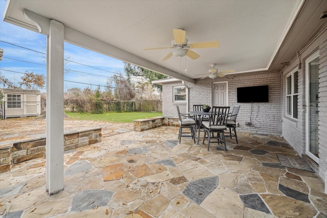 view of patio / terrace featuring ceiling fan