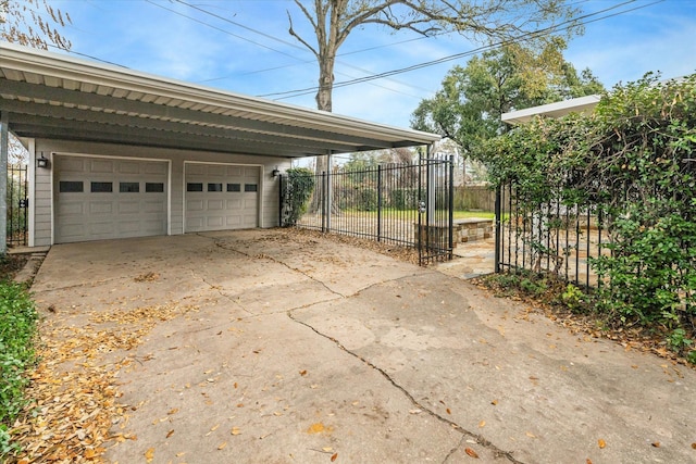 garage with a carport