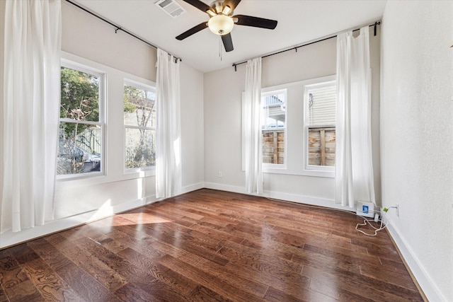 unfurnished room featuring hardwood / wood-style flooring and ceiling fan