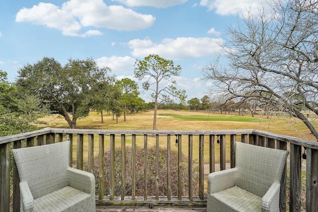 deck featuring a lawn