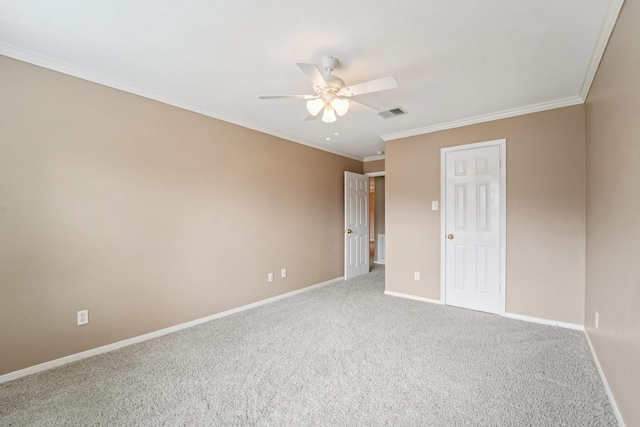 unfurnished bedroom featuring crown molding, ceiling fan, and carpet flooring