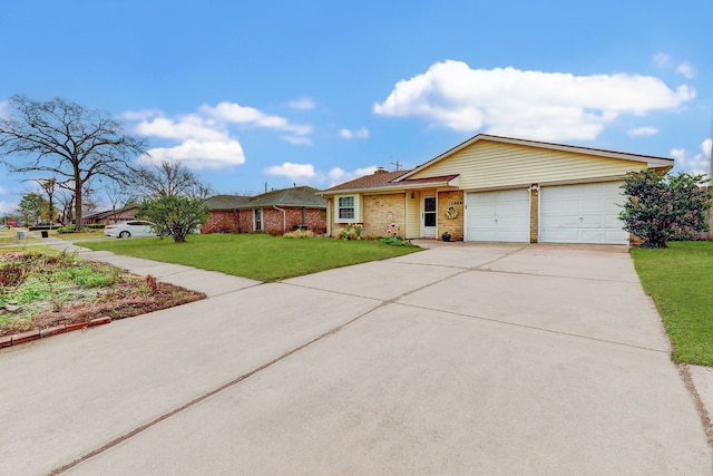 ranch-style house featuring a garage and a front lawn