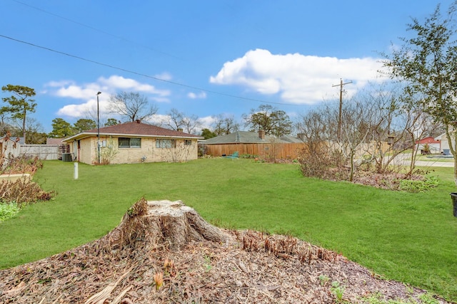 view of yard featuring central AC unit