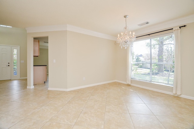 tiled spare room with an inviting chandelier and ornamental molding