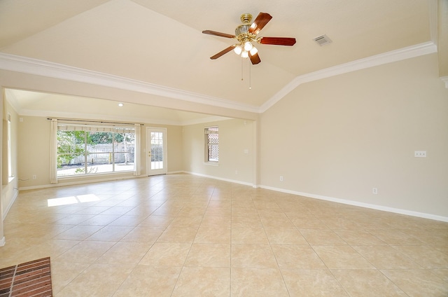 tiled spare room featuring crown molding, ceiling fan, and lofted ceiling