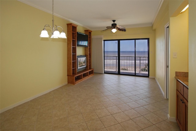 unfurnished living room with crown molding, ceiling fan with notable chandelier, and light tile patterned flooring