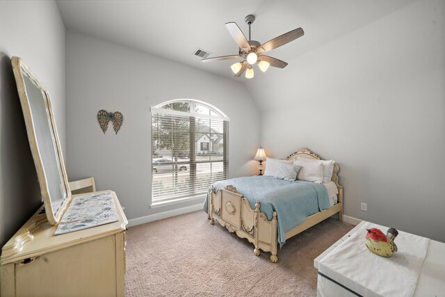 carpeted bedroom featuring ceiling fan and lofted ceiling