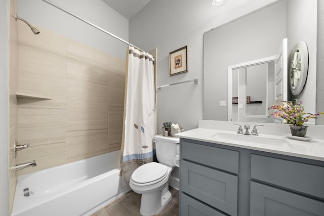 full bathroom featuring shower / bathtub combination with curtain, vanity, wood-type flooring, and toilet