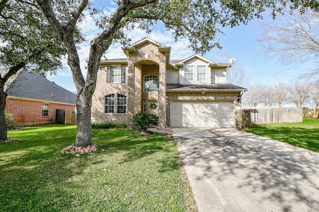 traditional home featuring a garage, driveway, a front lawn, and fence