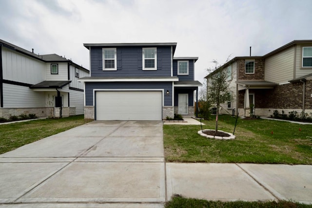 view of property featuring a garage and a front yard