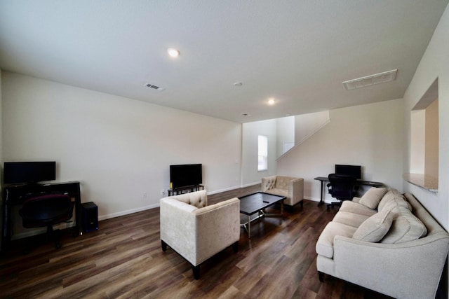 living room featuring dark wood-type flooring