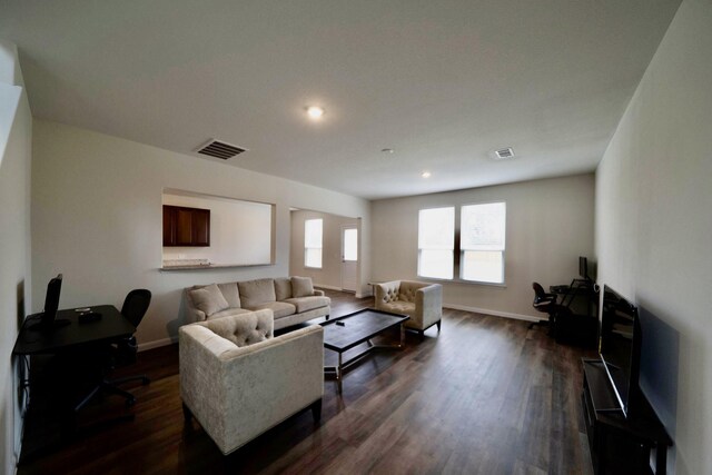 living room featuring dark hardwood / wood-style floors