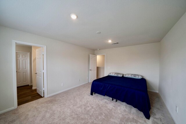 bedroom featuring carpet