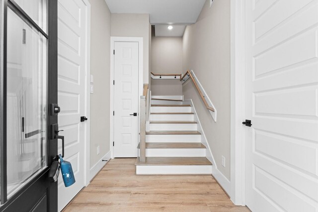 4013 Griggs Rd Unit L, Houston, TX 77021 - entrance foyer with recessed lighting, baseboards, stairway, and light wood-type flooring