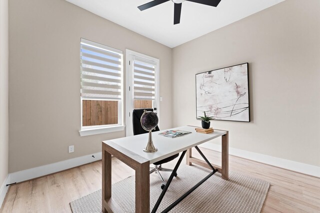4013 Griggs Rd Unit L, Houston, TX 77021 - office area with baseboards, a ceiling fan, and wood finished floors