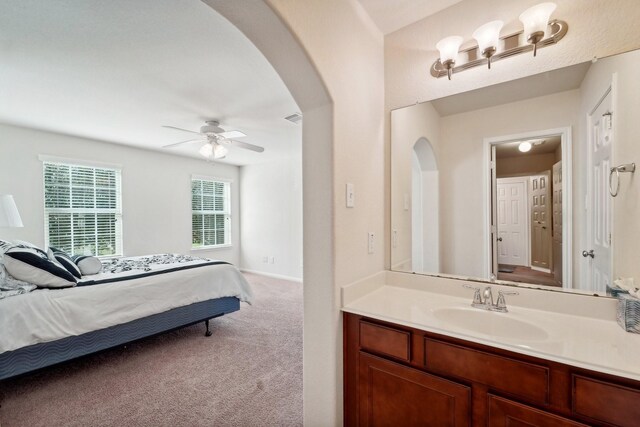 bathroom featuring vanity and ceiling fan