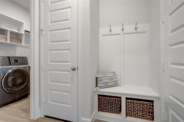 mudroom featuring washer / dryer and light wood-style flooring