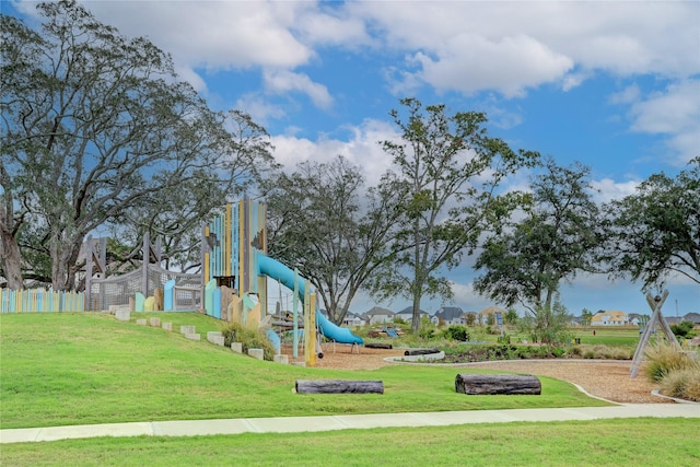 view of playground featuring a lawn