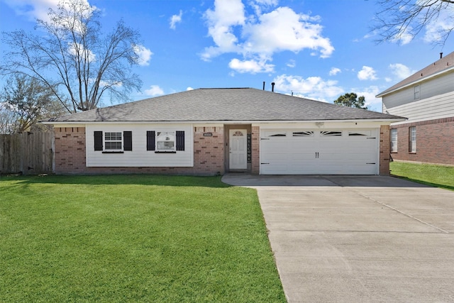 ranch-style home featuring a garage and a front lawn