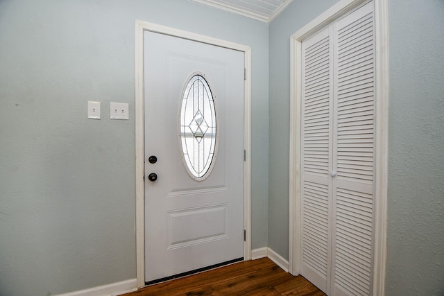 entryway with dark hardwood / wood-style floors