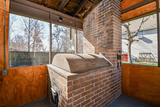 exterior space with vaulted ceiling and wooden ceiling