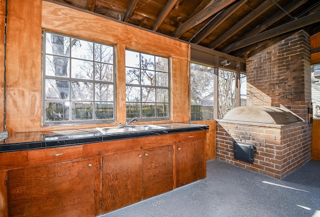 interior space with lofted ceiling and sink