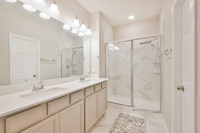 bathroom featuring vanity and a shower with shower door