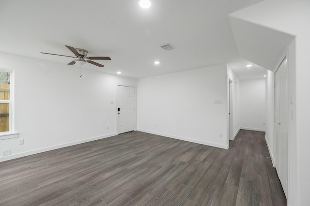 unfurnished room with ceiling fan and dark hardwood / wood-style floors