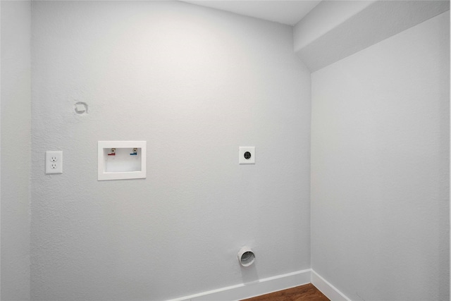 clothes washing area featuring hookup for a washing machine, wood-type flooring, and hookup for an electric dryer