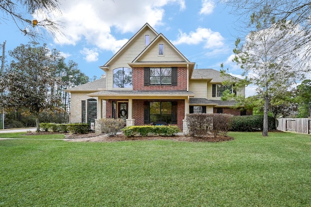 craftsman-style home with a front lawn