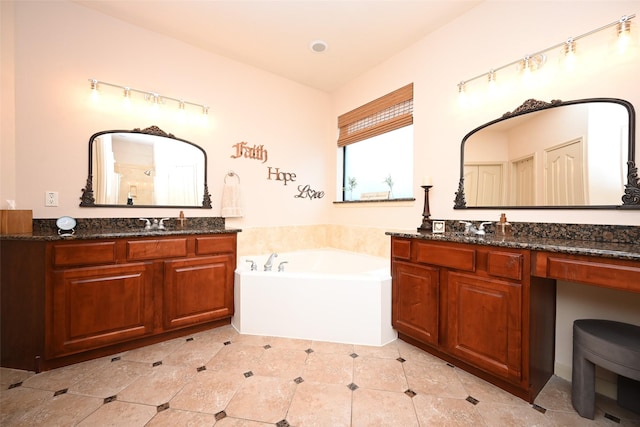 bathroom featuring vanity and a tub