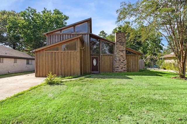 exterior space with a front lawn