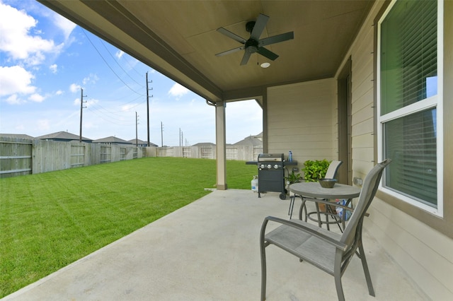 view of patio / terrace with a grill and ceiling fan