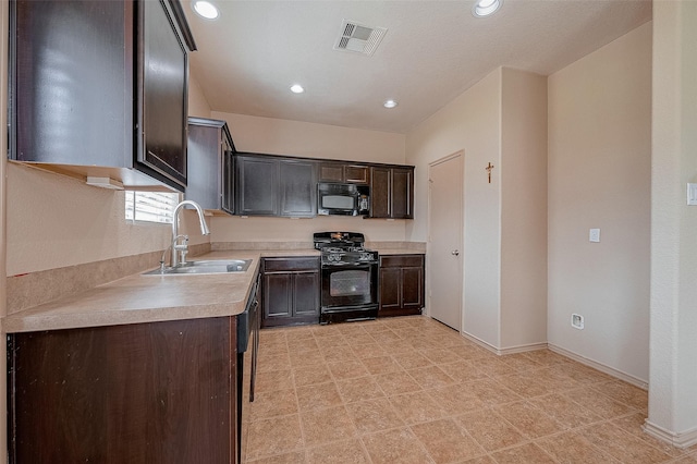 kitchen with sink, dark brown cabinets, and black appliances