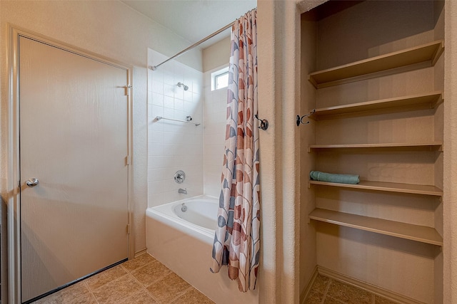 bathroom with shower / bath combo