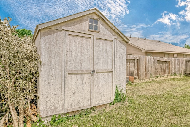 view of outdoor structure with a yard